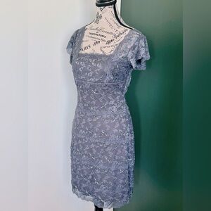 Dark gray cocktail dress, size 8. Jersey knit sparkly fabric. Great condition.